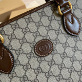 Handle and strap detail of sleek everyday-luxe women's handbag – women's everyday handbag