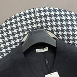 Flat lay presentation of Givenchy luxury clothing with everyday silhouette