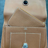 Side view of classic structured handbag