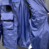 Close-up detail shot of Louis Vuitton luxury clothing with label-forward styling