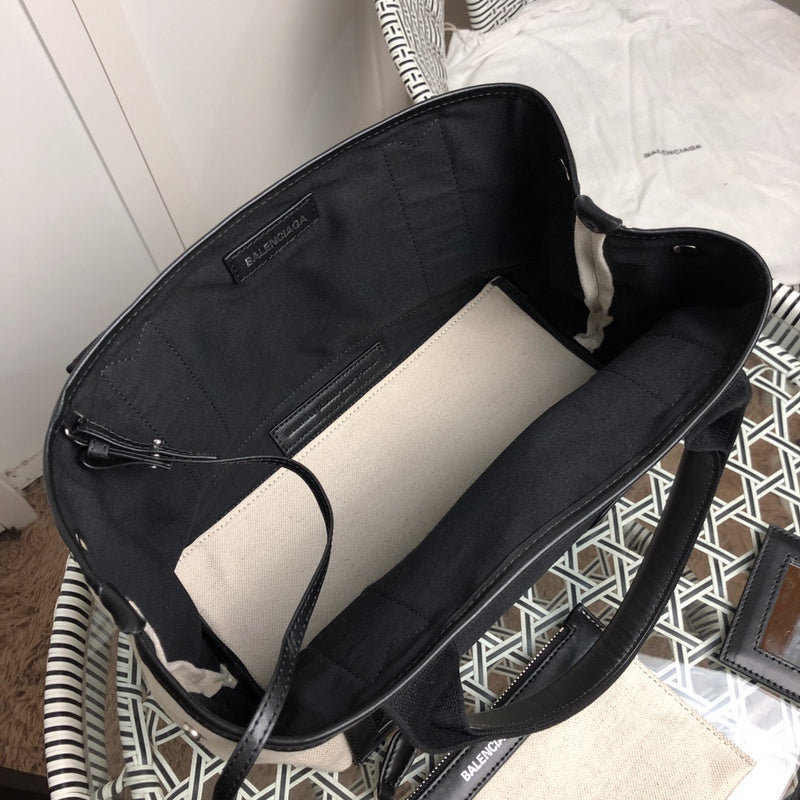 Close-up detail of modern everyday-luxe women's handbag – women's statement bag