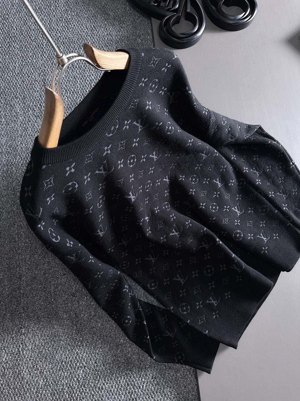 Close-up detail shot of Louis Vuitton luxury clothing with logo-detail design