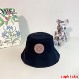 Side view of Louis Vuitton unisex cap