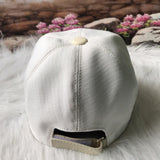 Angled view of Burberry unisex cap
