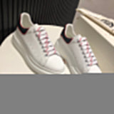 Alexander McQueen classic monochrome luxury sneakers view 9 heritage-inspired look