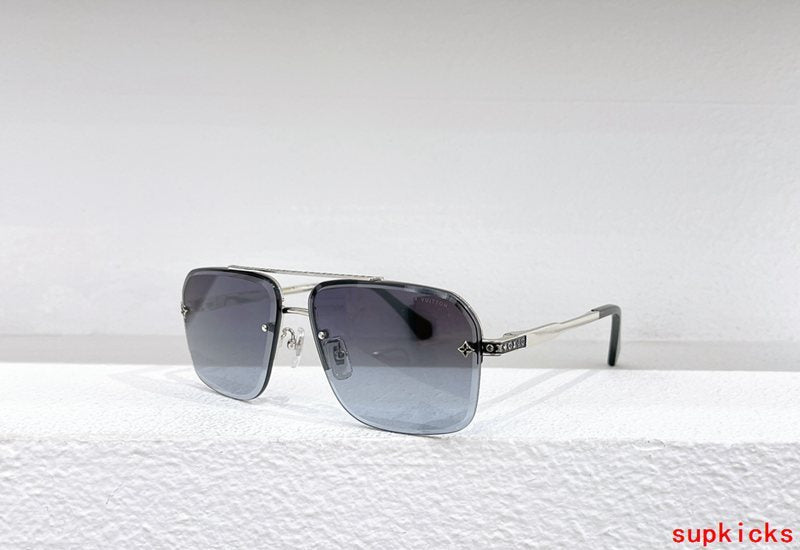 Close-up detail view of Louis Vuitton unisex sunglasses