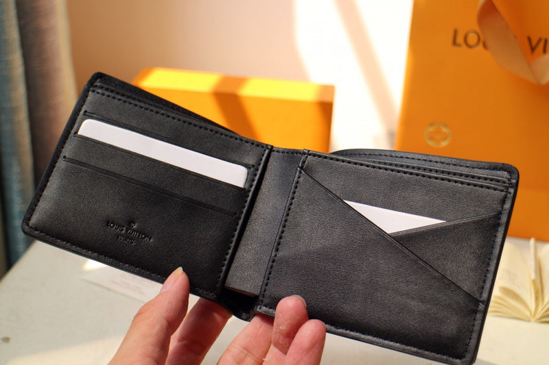 Styled lifestyle shot of signature sleek women's handbag – women's luxury accessory