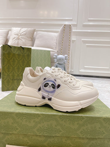 Gucci Casual sneakers in classic monochrome retro runner design front view