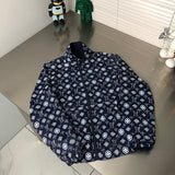 Side profile of Louis Vuitton luxury clothing with signature branding