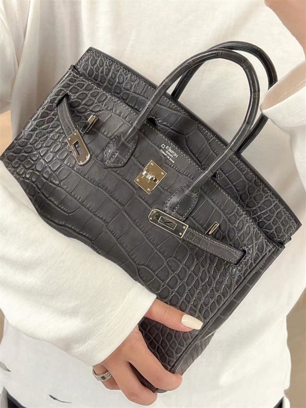 Side view of considered structured handbag