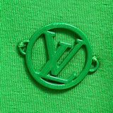 Flat lay presentation of Louis Vuitton luxury clothing with logo-detail design