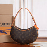  Polished top-handle bag carried on shoulder