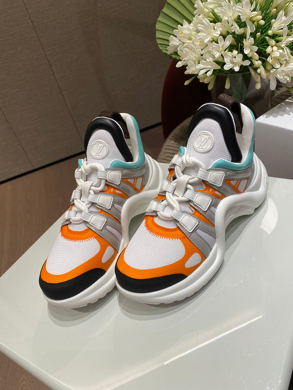 Louis Vuitton White Slip-On Sneakers - Angled View