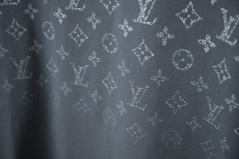 Flat lay presentation of Louis Vuitton cotton t-shirt with signature branding
