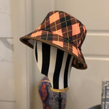 Close-up detail view of Burberry unisex cap