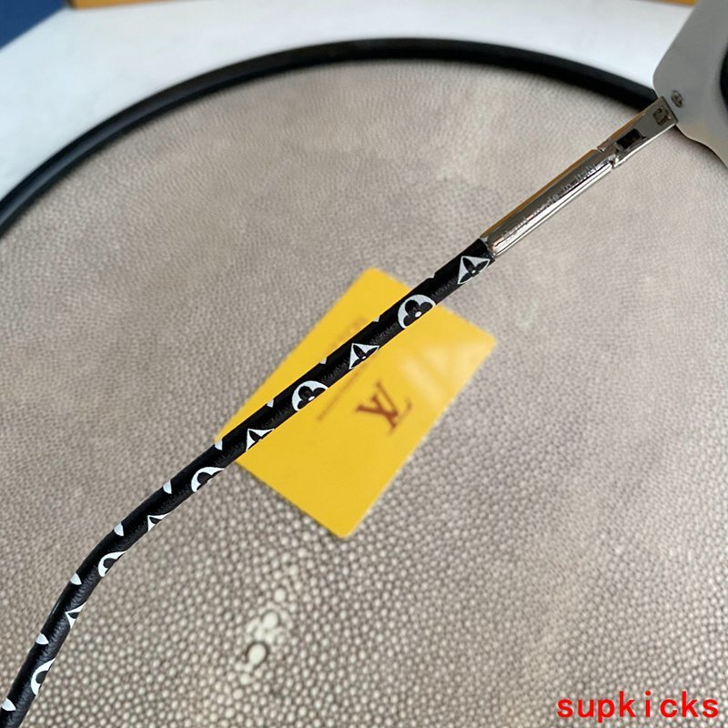 Close-up detail view of Louis Vuitton unisex sunglasses