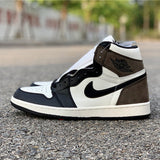 Nike Designer sneakers in fresh white-and-black signature lace-up style front view