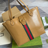 Handle and strap detail of modern everyday-luxe women's handbag – women's statement bag