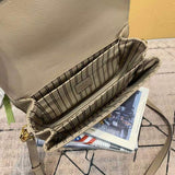 Side profile of classic signature women's handbag – women's luxury accessory