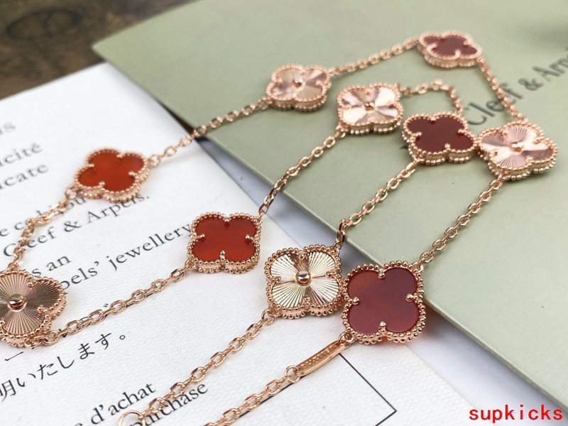 Lifestyle view of Van Cleef & Arpels unisex jewelry piece