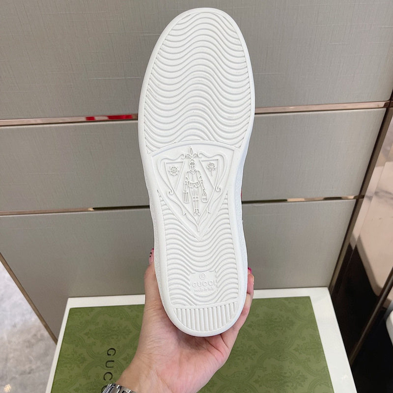 Side profile of Gucci two-tone sneakers signature lace-up style