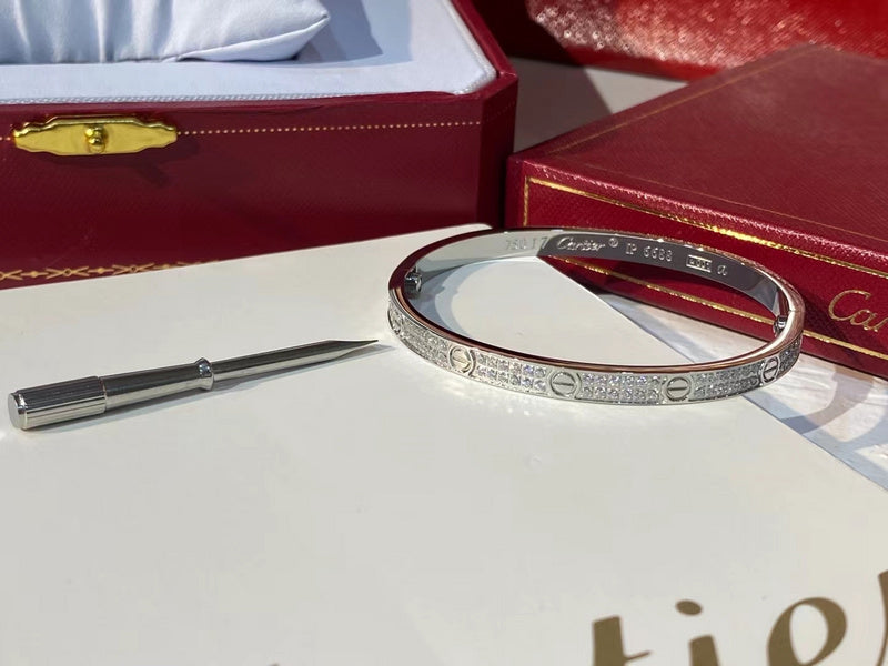 Side view of Cartier unisex jewelry piece