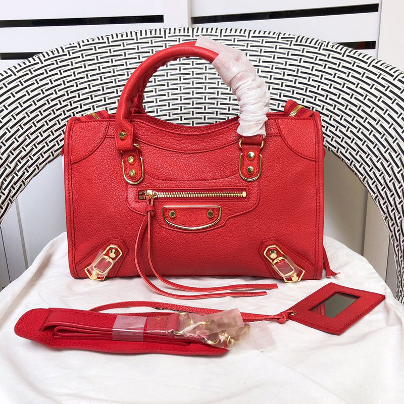 Front view of statement polished women's handbag – women's designer-style accessory