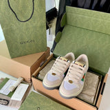Side profile of Gucci two-tone sneakers signature lace-up style