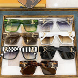 Close-up detail view of Louis Vuitton unisex sunglasses