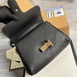 Close-up detail of everyday-luxe sleek women's handbag – women's statement bag