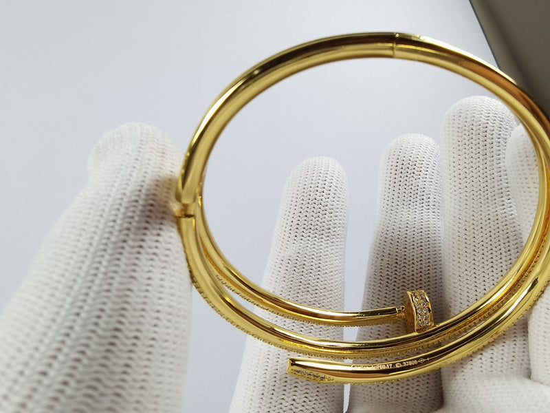 Side view of Cartier unisex jewelry piece