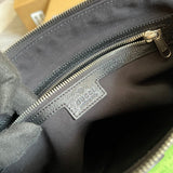 Front view of elevated structured women's handbag – women's designer-style accessory
