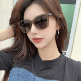 Lifestyle view of Louis Vuitton unisex sunglasses