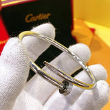 Angled view of Cartier unisex jewelry piece