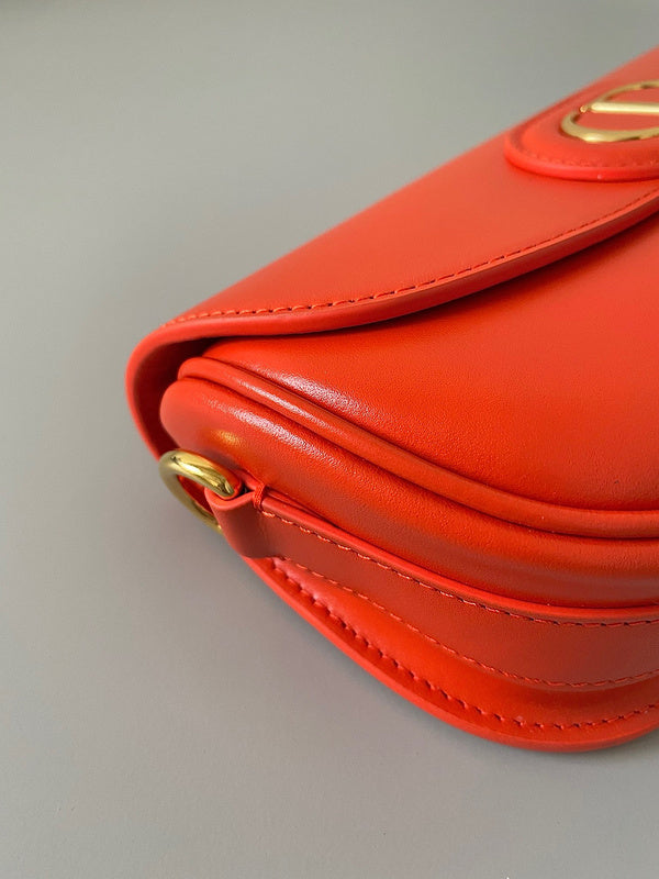 Styled lifestyle shot of statement sleek women's handbag – women's designer-style accessory