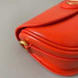 Styled lifestyle shot of statement sleek women's handbag – women's designer-style accessory