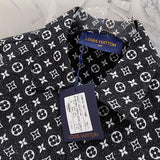 Side profile of Louis Vuitton luxury clothing with label-forward styling