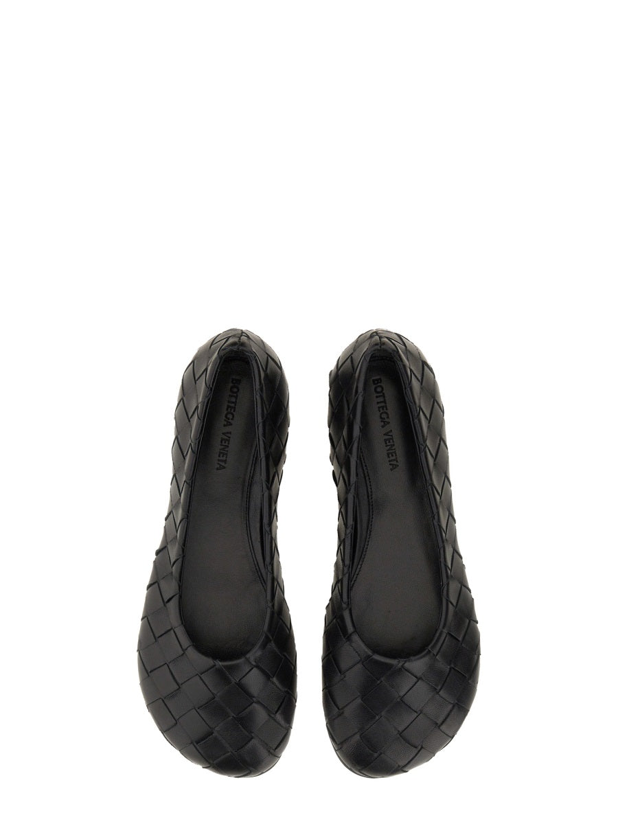 Close-up of Bottega Veneta flats hardware and fine stitching