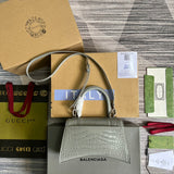 Front view of polished elevated women's handbag – women's designer-style accessory