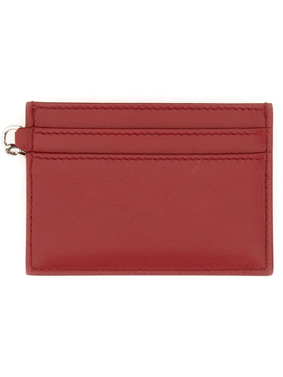 Close-up of Alexander McQueen wallets hardware and fine stitching