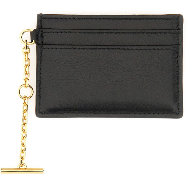 Close-up of Alexander McQueen wallets hardware and fine stitching