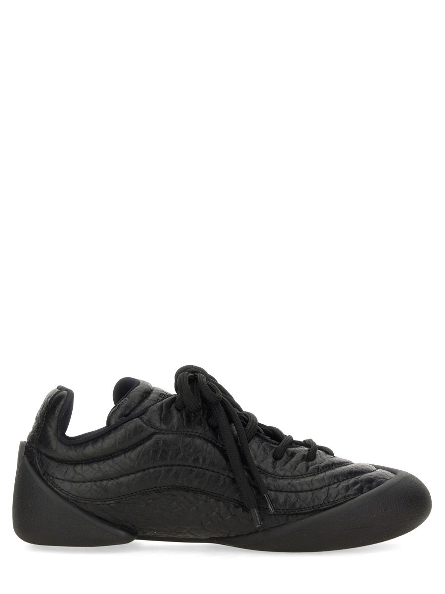 Alexander McQueen athletic luxury designer piece front view