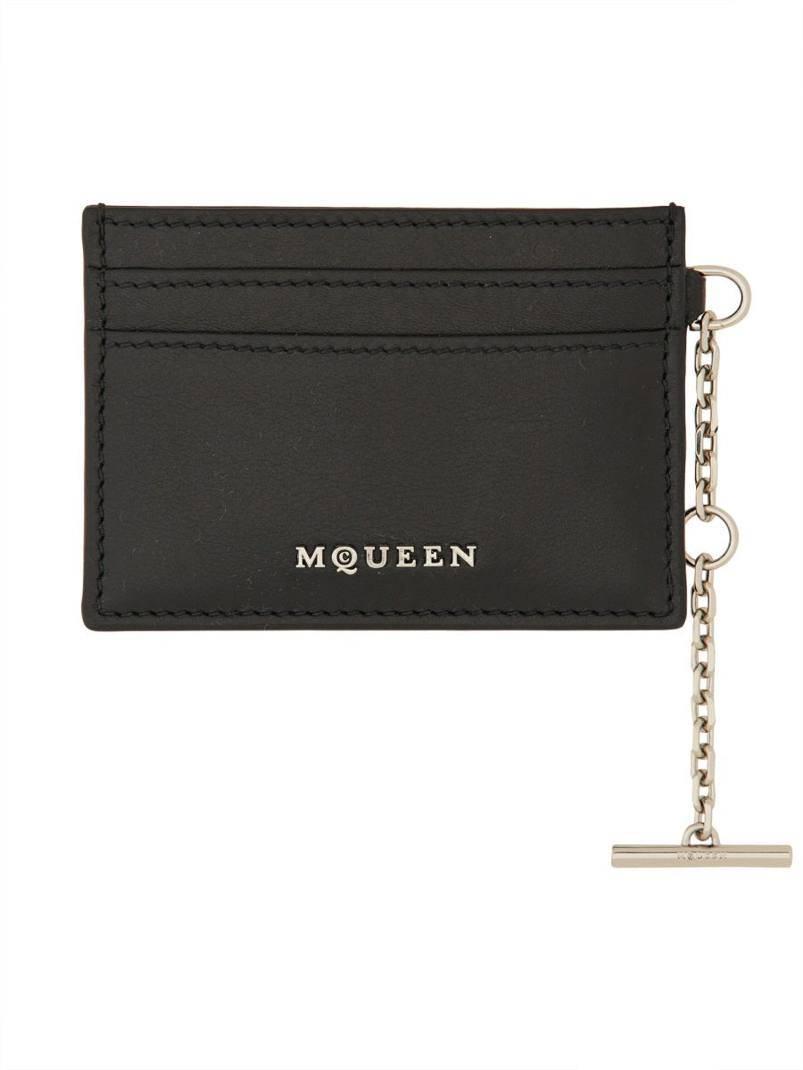 Close-up of Alexander McQueen wallets hardware and fine stitching