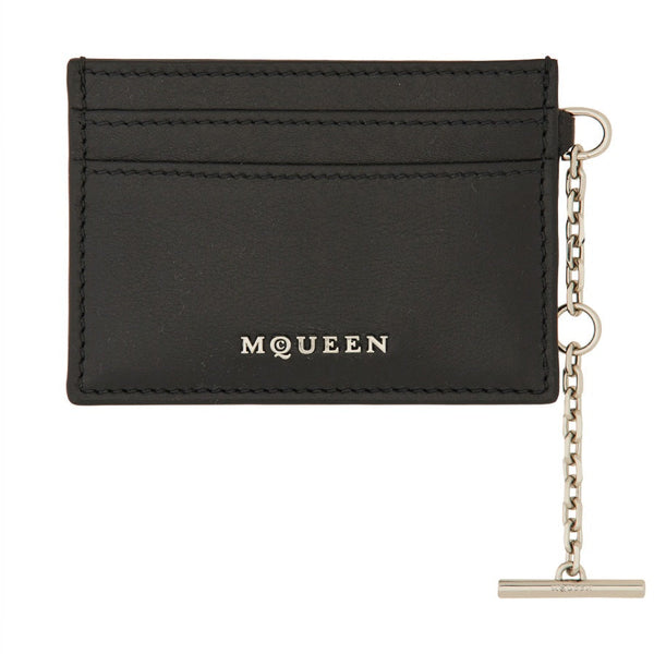 Close-up of Alexander McQueen wallets hardware and fine stitching
