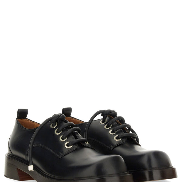 Close-up of Alexander McQueen athletic hardware and fine stitching