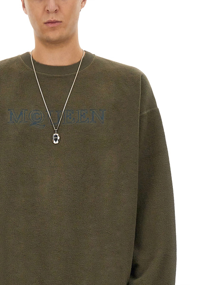 Close-up of Alexander McQueen sweaters & pullovers hardware and fine stitching