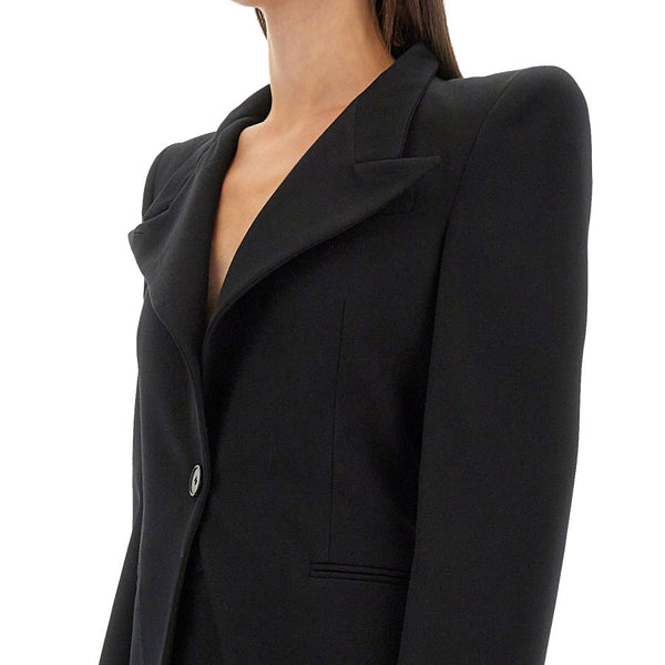 Close-up of Alexander McQueen jackets hardware and fine stitching