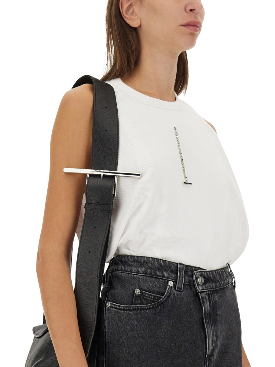 Close-up of Alexander McQueen tee shirts hardware and fine stitching