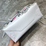 Statement Faux Leather Handbag - Smooth Faux-Leather Exterior | Women's Premium Handbag #638 - styled full view (image 7) of designer-inspired handbag