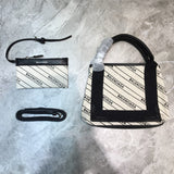 Sophisticated Faux Leather Handbag - Chic Everyday Appeal | Women's Everyday Carry Handbag #756 - side angle view (image 2) of designer-inspired handbag
